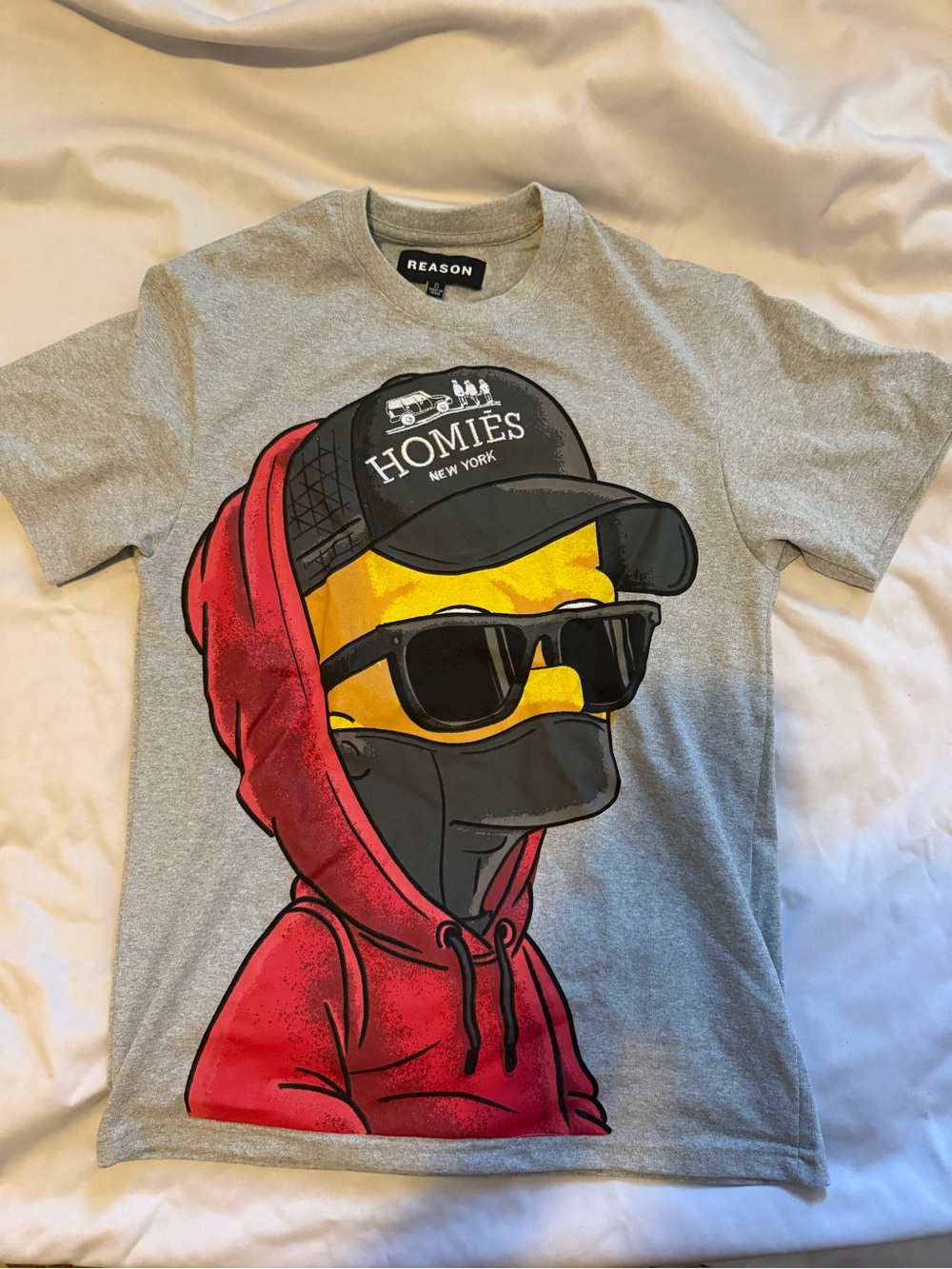 Reason Graphic Tee with Red Hoodie and Yellow Face